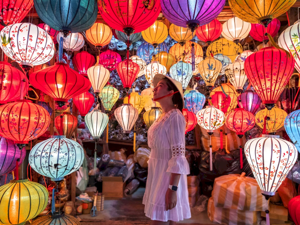 You can take a picture at lantern shops in Hoi An